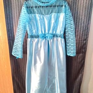 A blue satin and lacey dress.